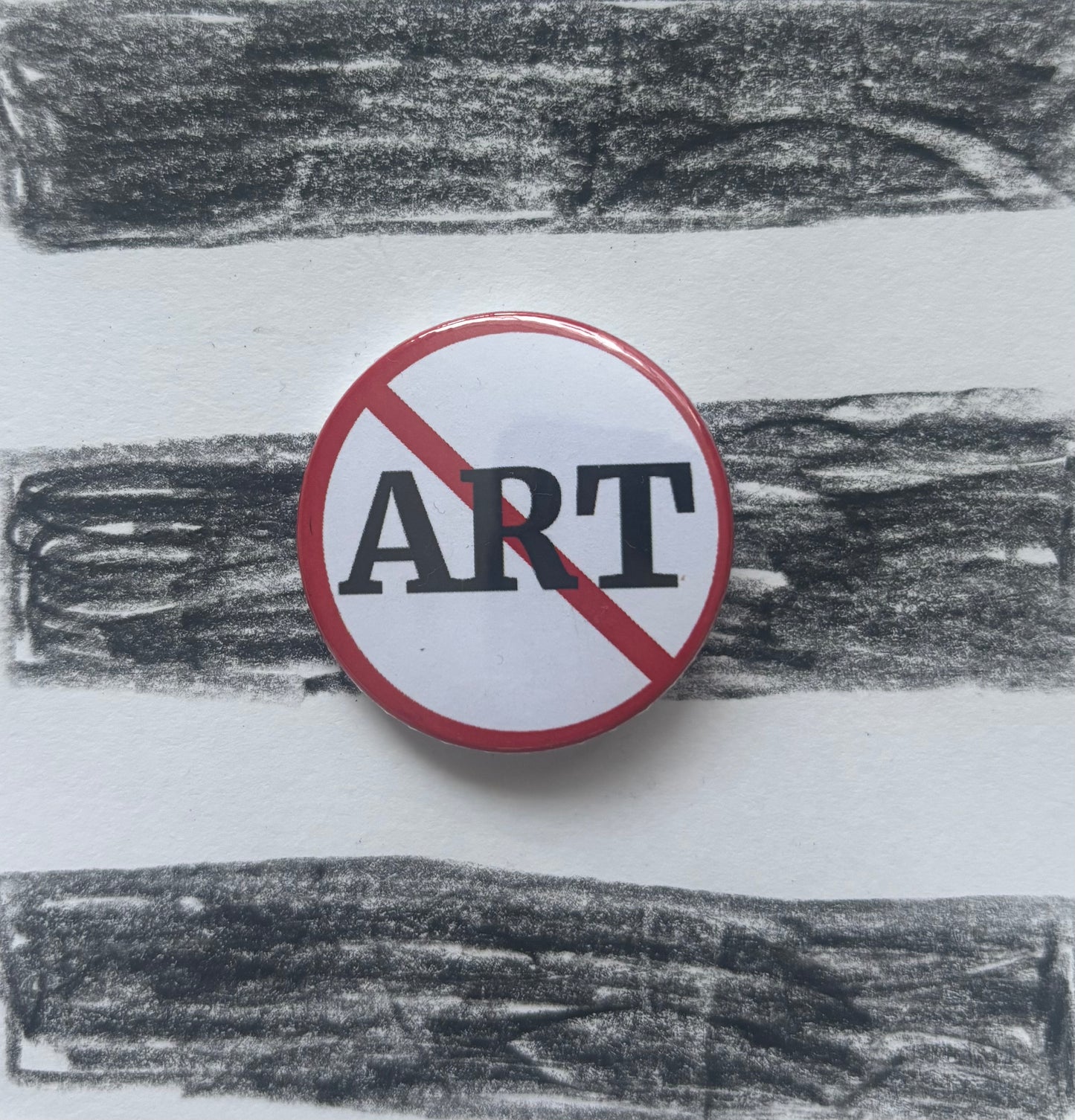 NO ART Badge